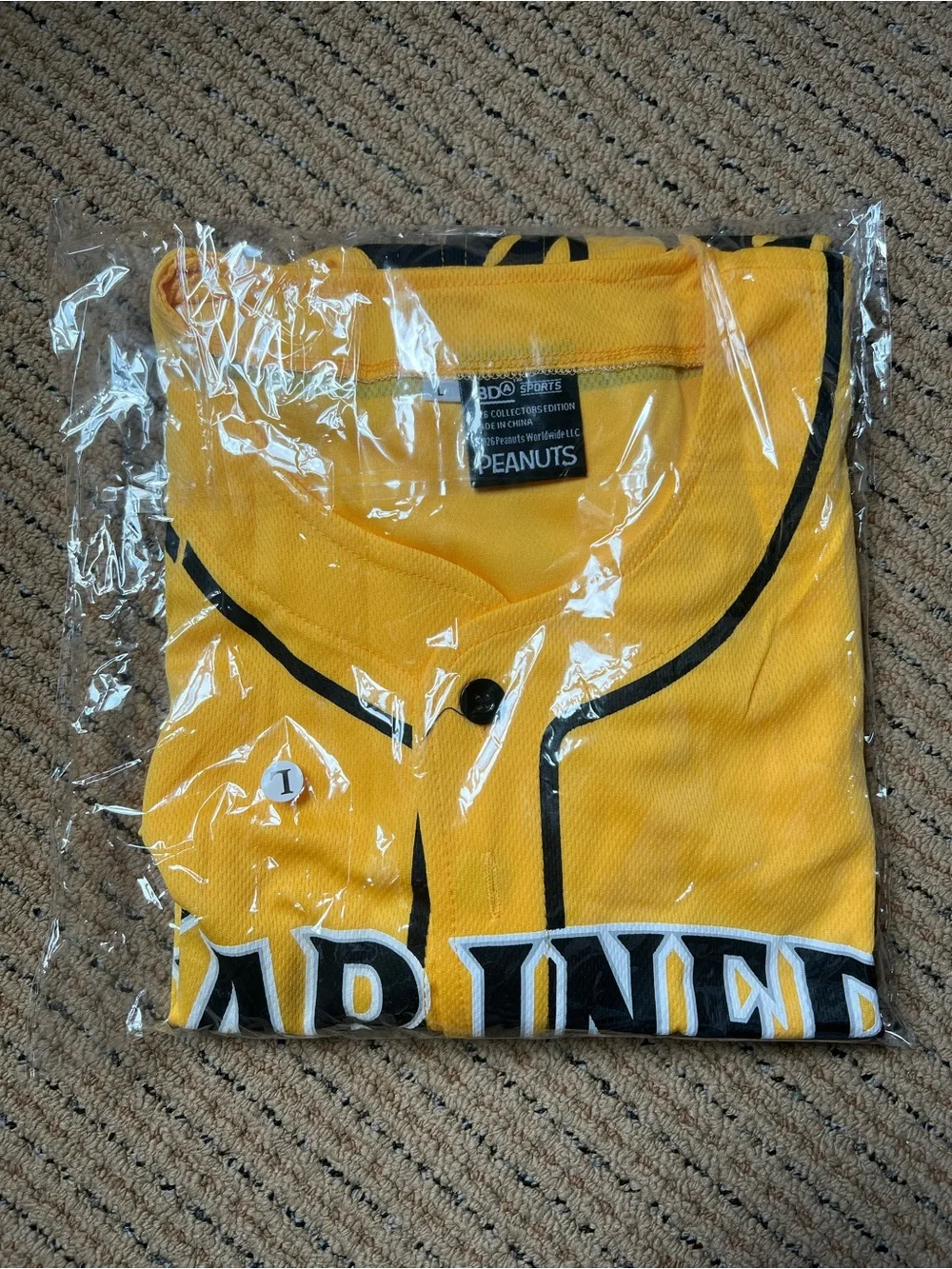 🆕 Peanuts x Seattle Mariners Men’s Baseball Charlie Brown Yellow Black Jersey
